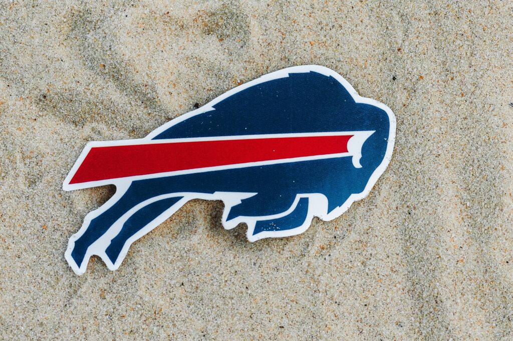 The logo of the Buffalo Bills football club on the sand of the beach