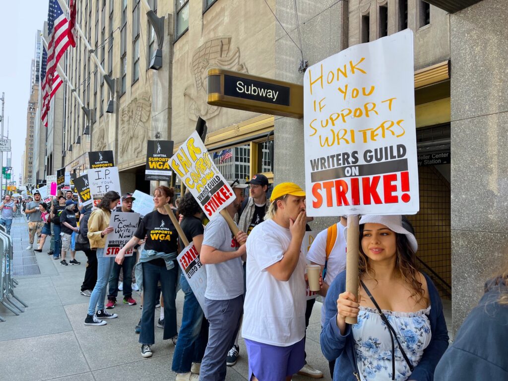 Union members join the picket line in front of Radio City Music Hall in Manhattan